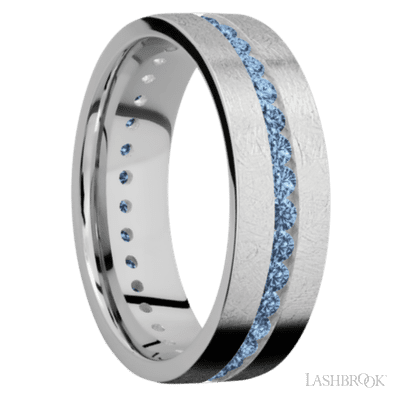 7 mm wide/Flat/14K White Gold band with an Eternity arrangement of .03 carat Round Denim Sapphire stones in a Channel setting.