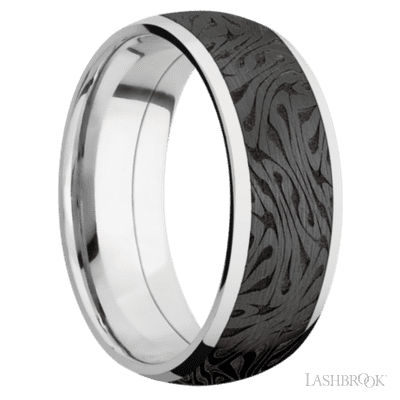 8 mm wide/Domed/Cobalt Chrome band with one 6 mm Centered inlay of Zirconium with a laser carved Escher 1 pattern.