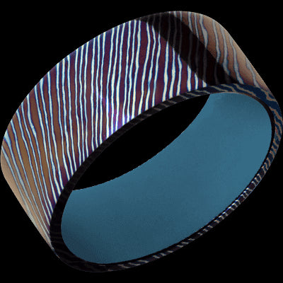 9 mm wide Flat Titanium Damascus band featuring a Royal Blue sleeve.