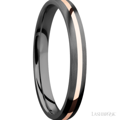 3 mm wide/Domed/Zirconium band with one 1 mm Centered inlay of 14K Rose Gold.