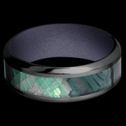 8 mm wide/High Bevel/Zirconium band with one 4 mm Centered inlay of Black Mother of Pearl also featuring a Crushed Orchid sleeve.